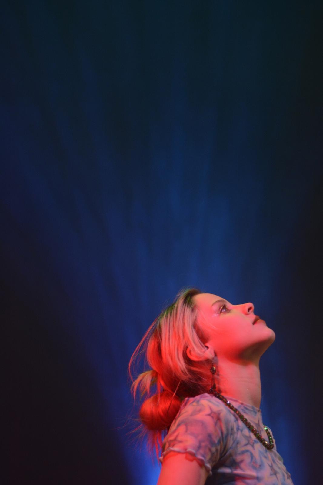Moments - Bella Burney looks up during a concert with The Burney...