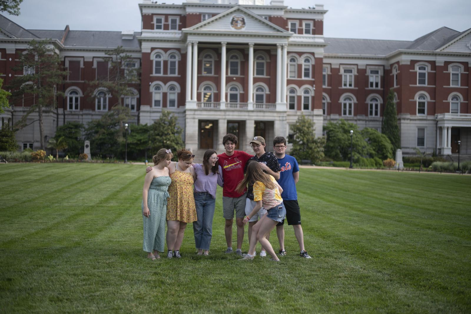 My friends gather in front of Jesse Hall on June 1, 2021, at the University of Missouri in Columbia, Mo. 