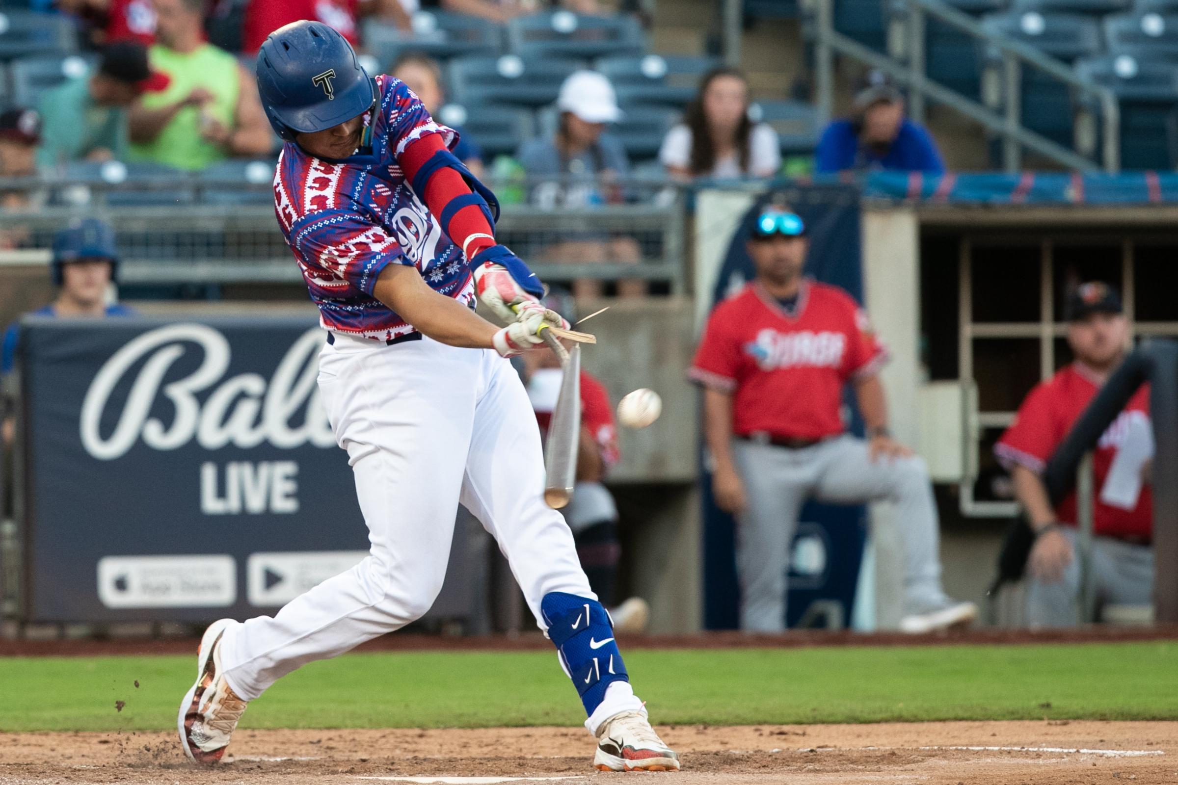Sports - Tulsa Drillers catcher Diego Cartaya (17) breaks his bat...