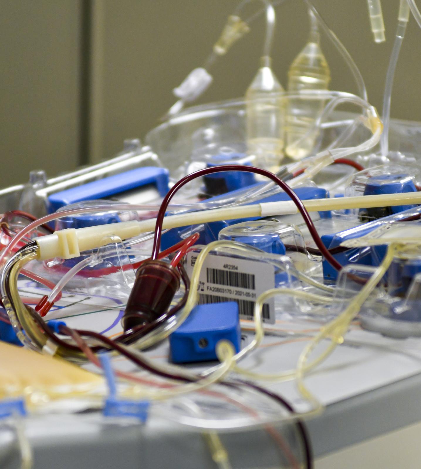Donation Drives Continue at Red Cross - Wires to a machine separating blood and platelets on...