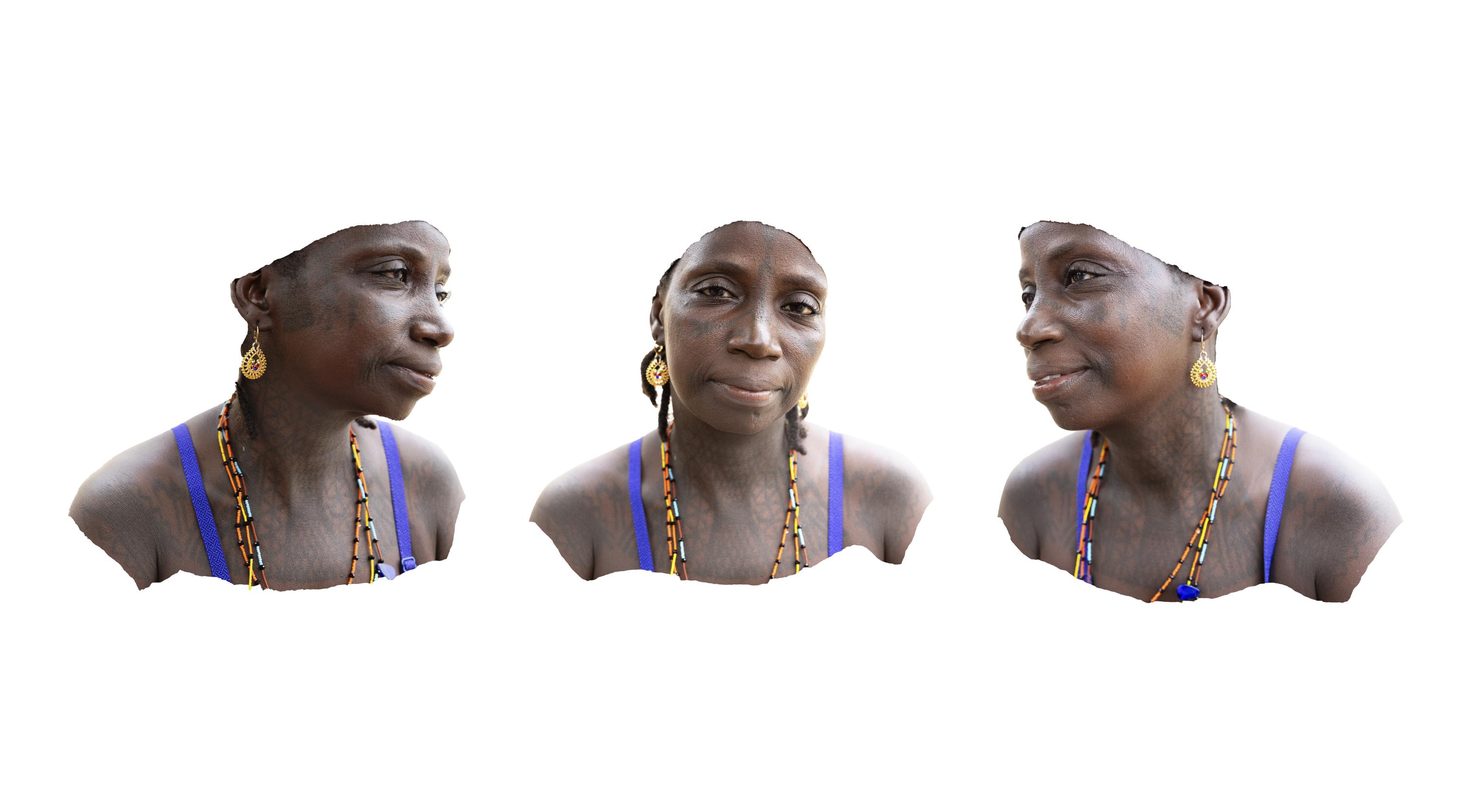 Kwalliya -The Evolution - Amina's cultural tattoos adorn her face and body as...