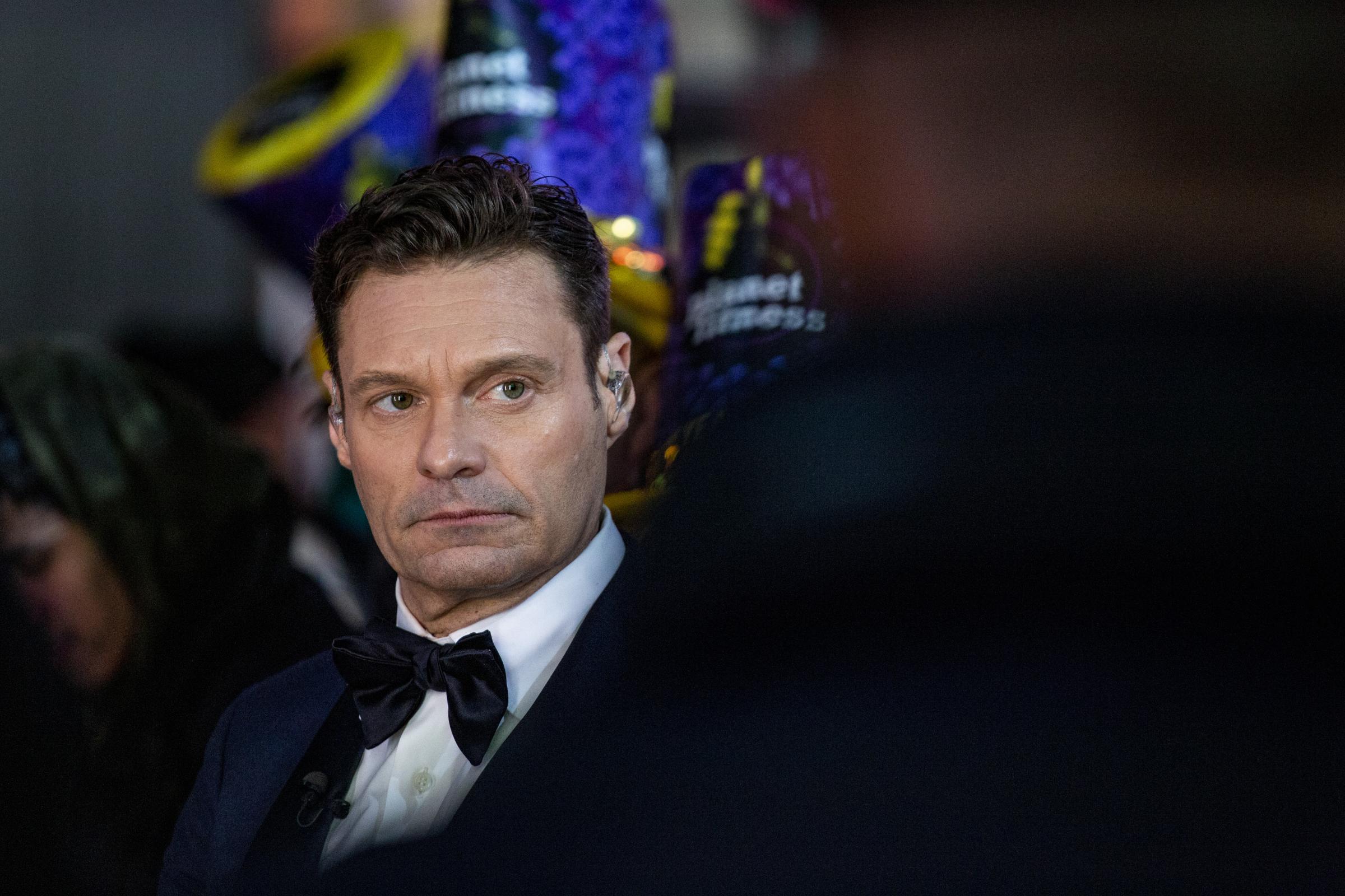 New Year’s Eve in Times Square - Host Ryan Seacrest in-between live takes at the 2023 New...