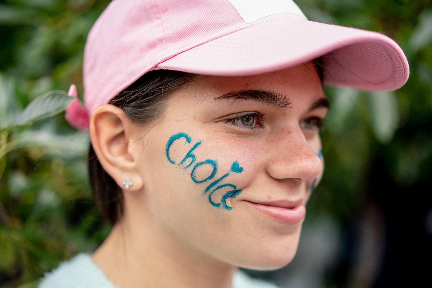Roe v. Wade Protests - A demonstrator with the word “choice” on her...