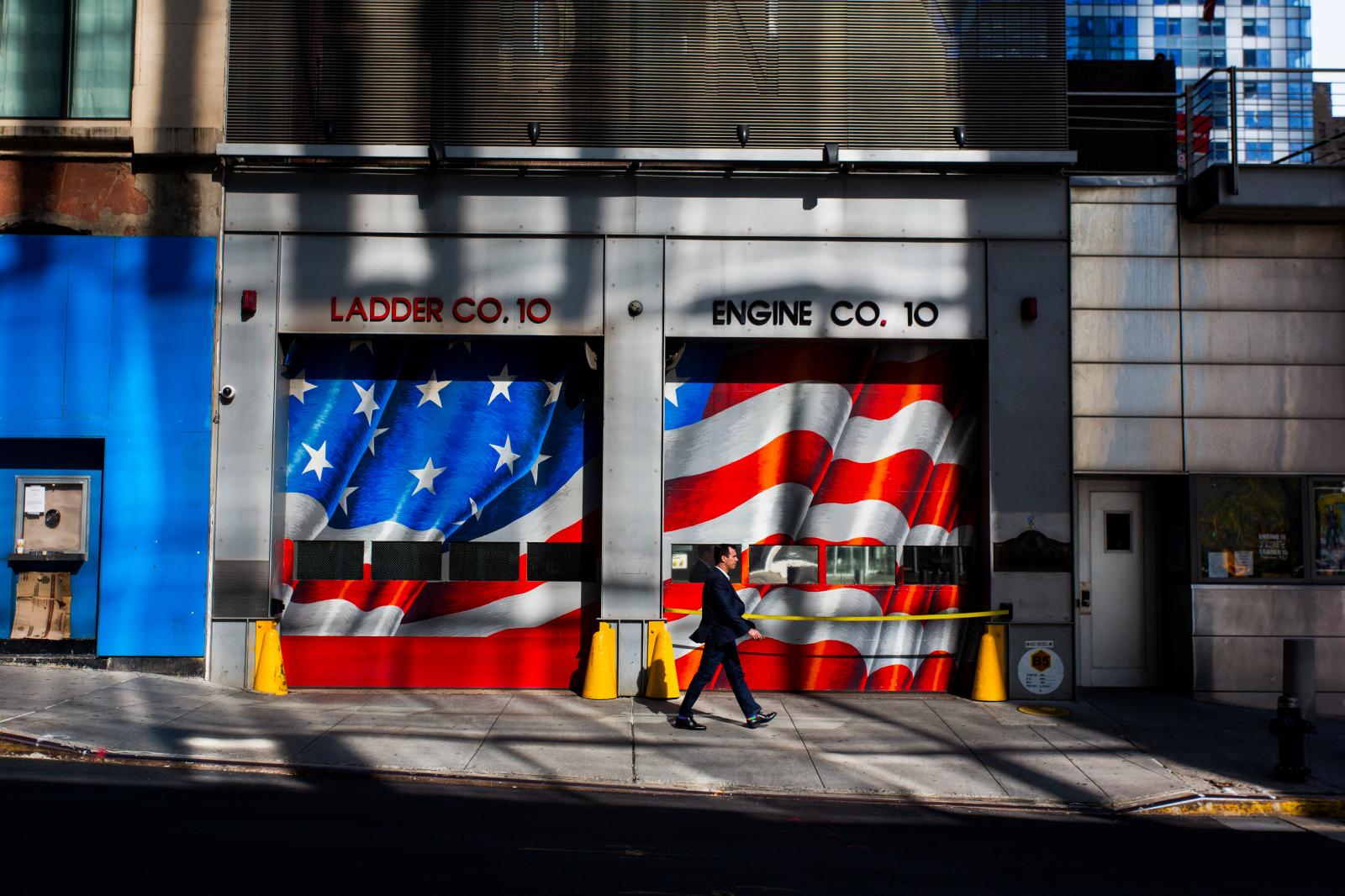 A businessman walks past Fireho...y&#39;s Financial District.