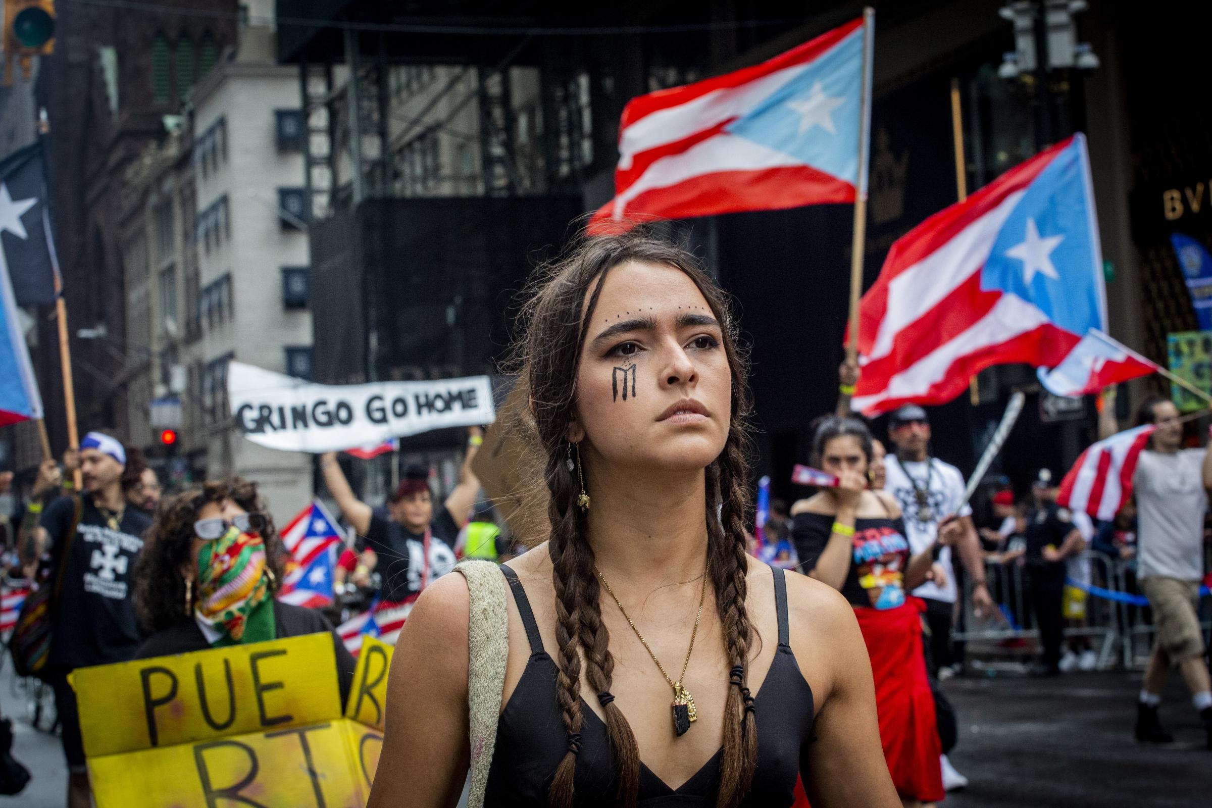 Singles - Protestors march during the National Puerto Rican Day...