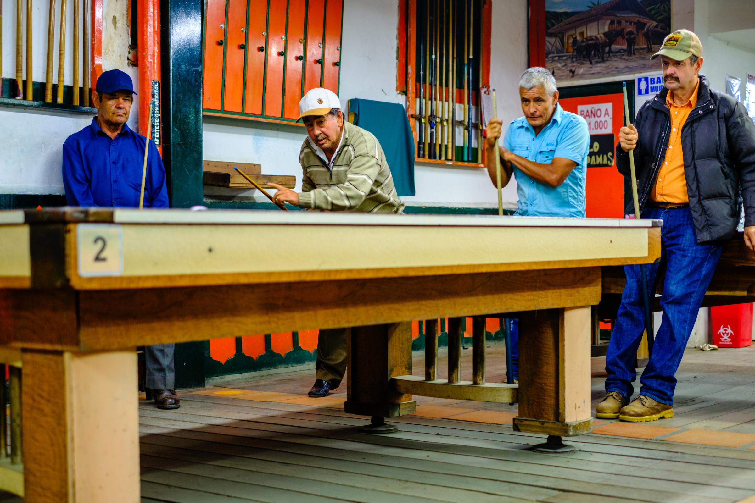 Eje Cafetero Colombia - Local population gather around pool tables, at Bar...