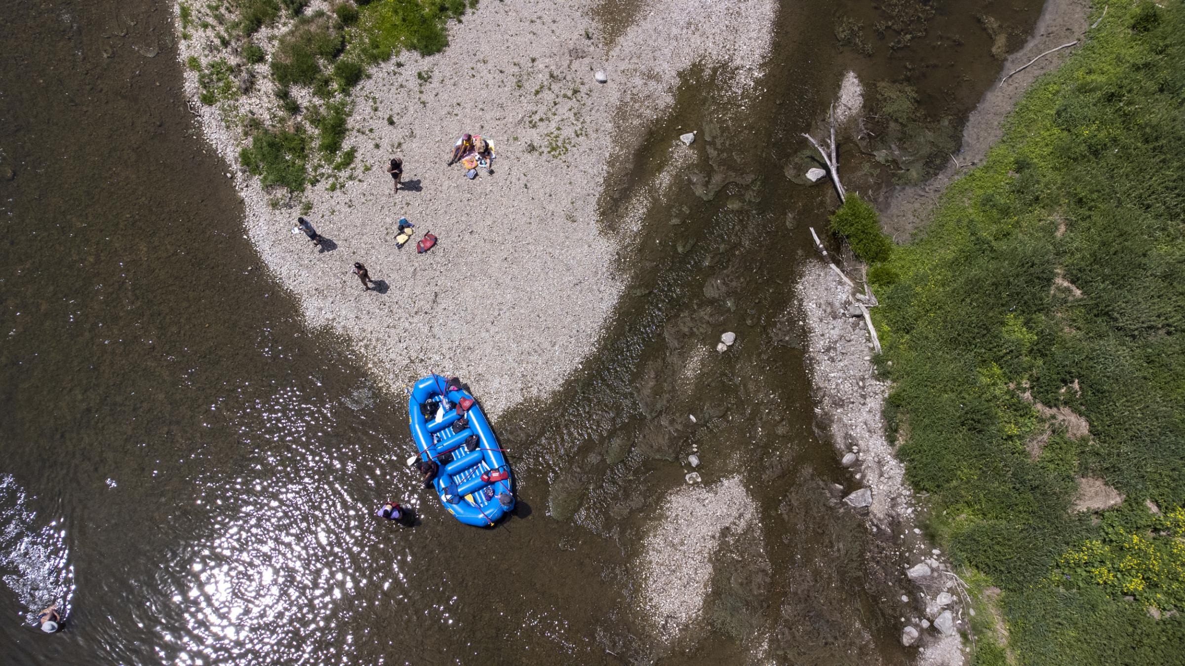 [Globe and Mail] Colour the Trails - An aerial shot of rafting participants during their lunch...