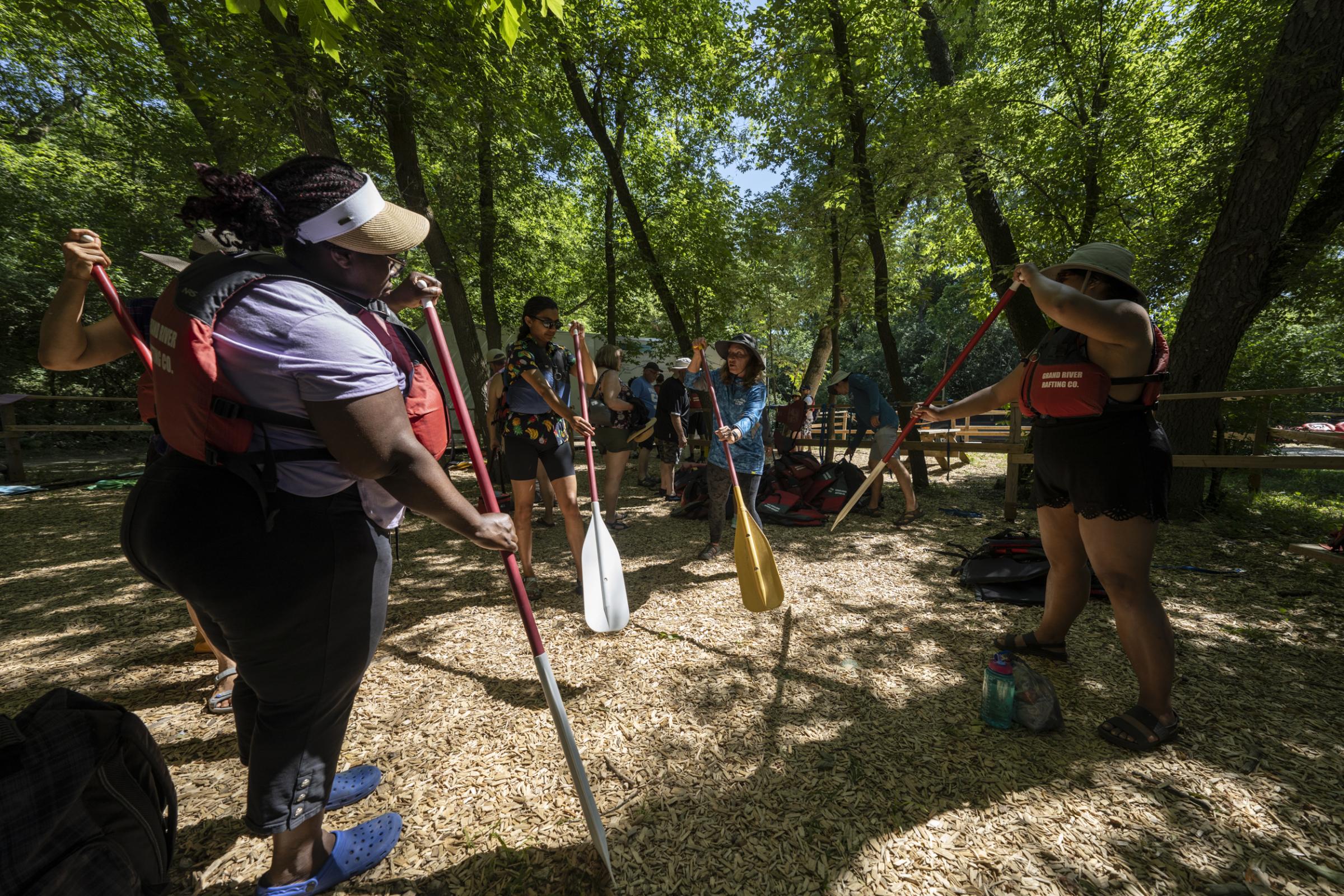 [Globe and Mail] Colour the Trails - Rafting participants get a lesson from the guide before...