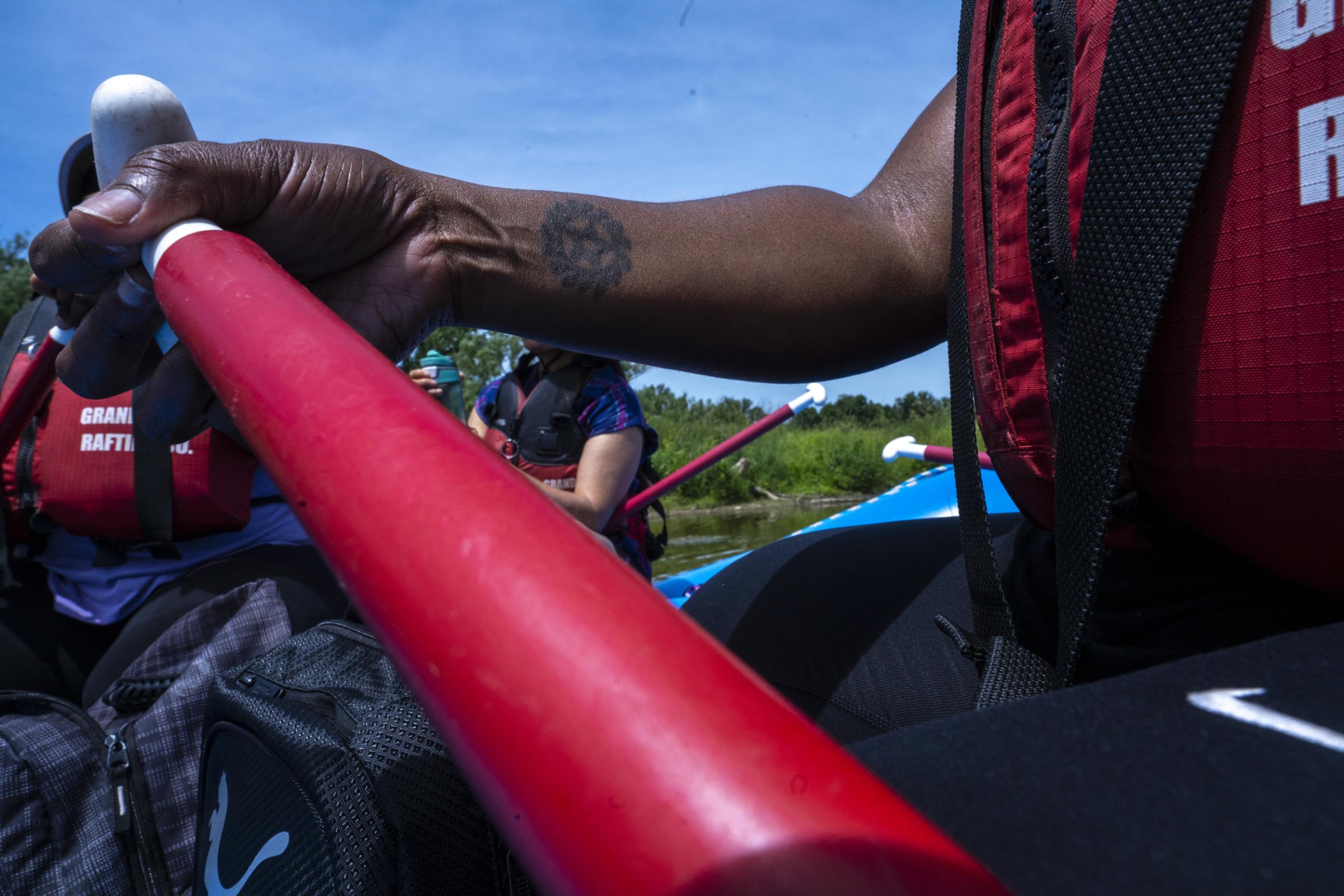 [Globe and Mail] Colour the Trails - A Colour the Trails rafting participant holds her paddle...