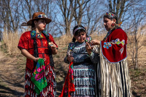 Turtle Protectors - Three dancers get ready for an opening ceremony before a prescribed burning in Toronto on...