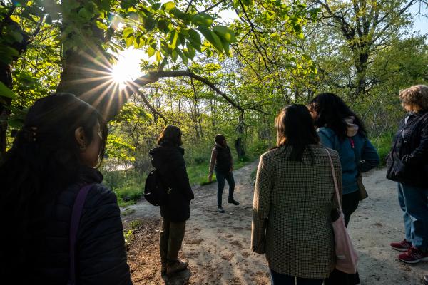 Turtle Protectors - Carolynne Crawley points out a popular turtle nesting path near Cherry Blossom Hill to a group of...