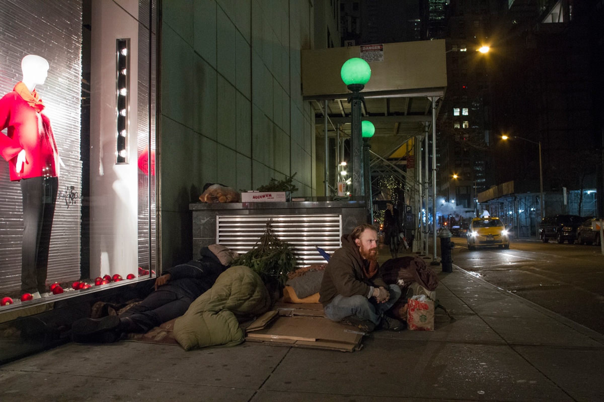 Singles -  Jamil sits outside a subway station before he is about...
