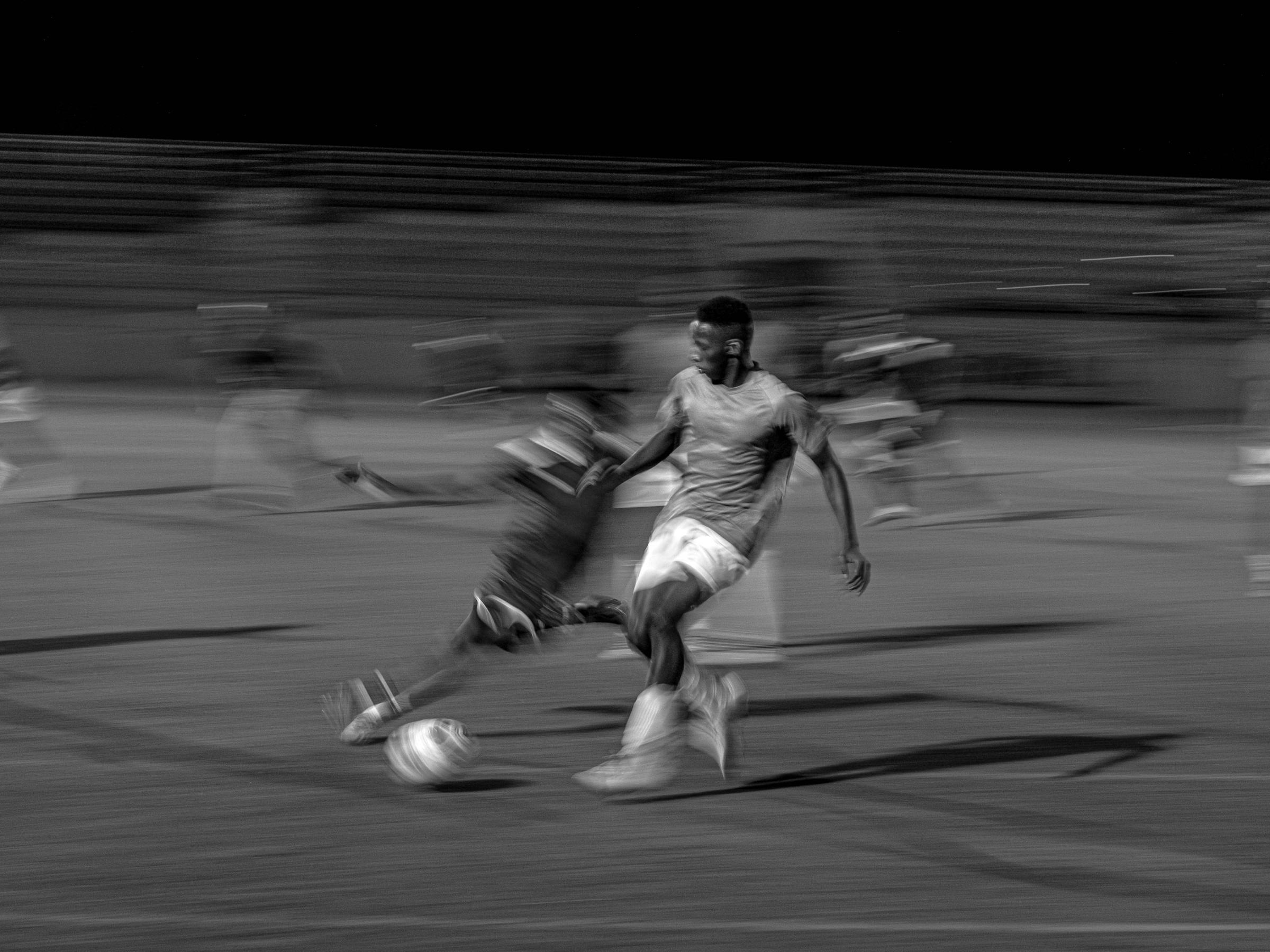 Almanzora's dust - A blur of motion as a player from the Senegalese team in...