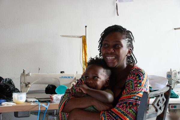 Image from Fashioning a Business - Motherhood for Motapwa means she sometimes shares a laugh...