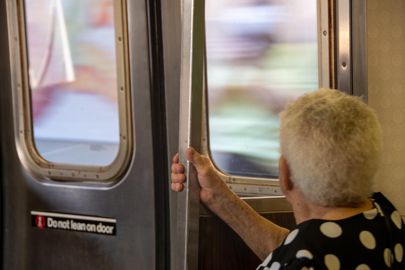 Old Woman On Train | Buy this image
