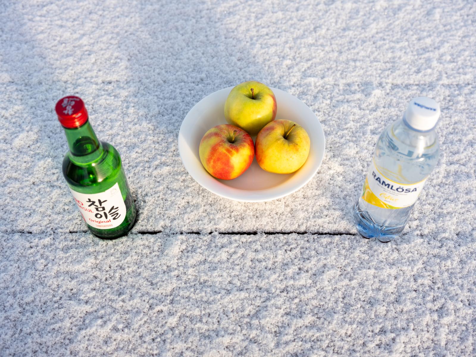 An offering of Korean soju, app...re-ceremony ritual in Dronningm