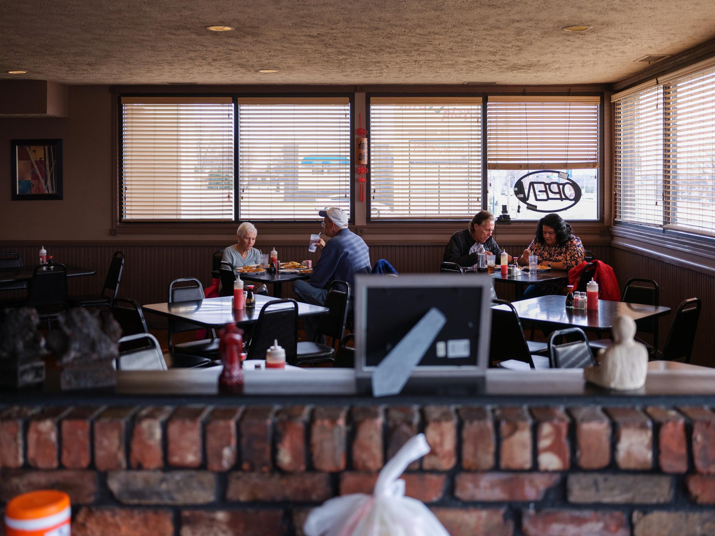 PAPILLION, NE - MARCH 18, 2022: Diners eat dinner inside of Ming&#39;s Restaurant in Papillion, Nebraska on March 18, 2022. (Photo by Arin Yoon for The Washington Post) Papillion United States