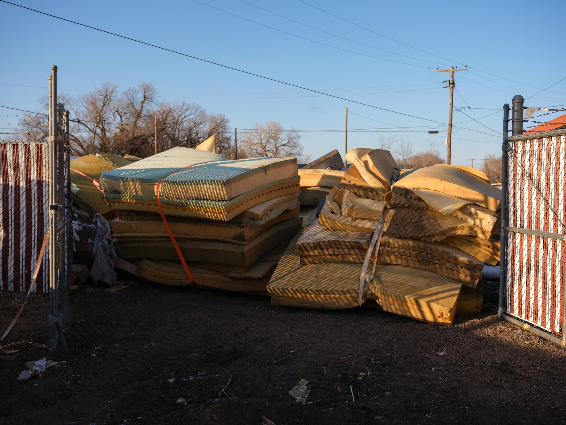 Piled up mattresses at Floyd Bledsoe&#39;s mattress recycling facility in Hutchinson, Kansas, USA on January 15, 2022. Assignment code 20220115InnocentMan Hutchinson USA