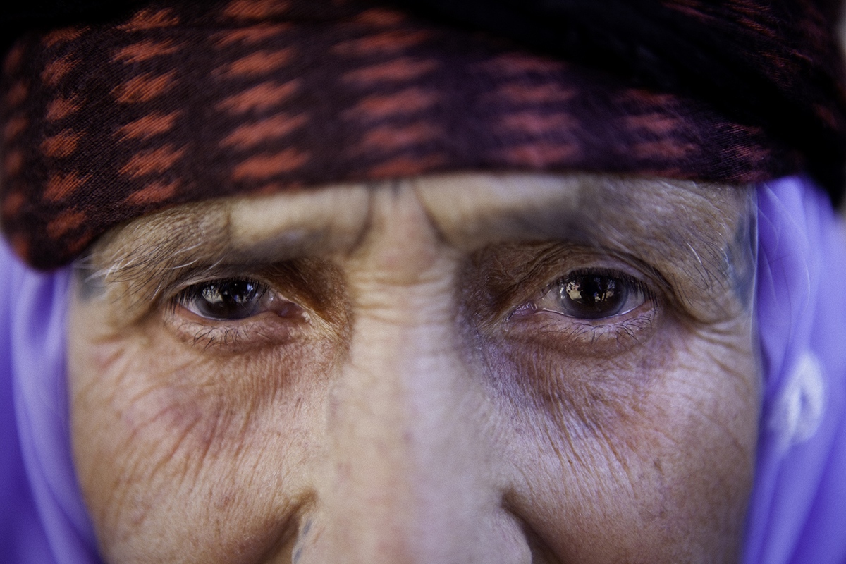 Kurdish Women: Inside, Outside -  Close-up of an elder Yezidi woman, in a Viransehir...