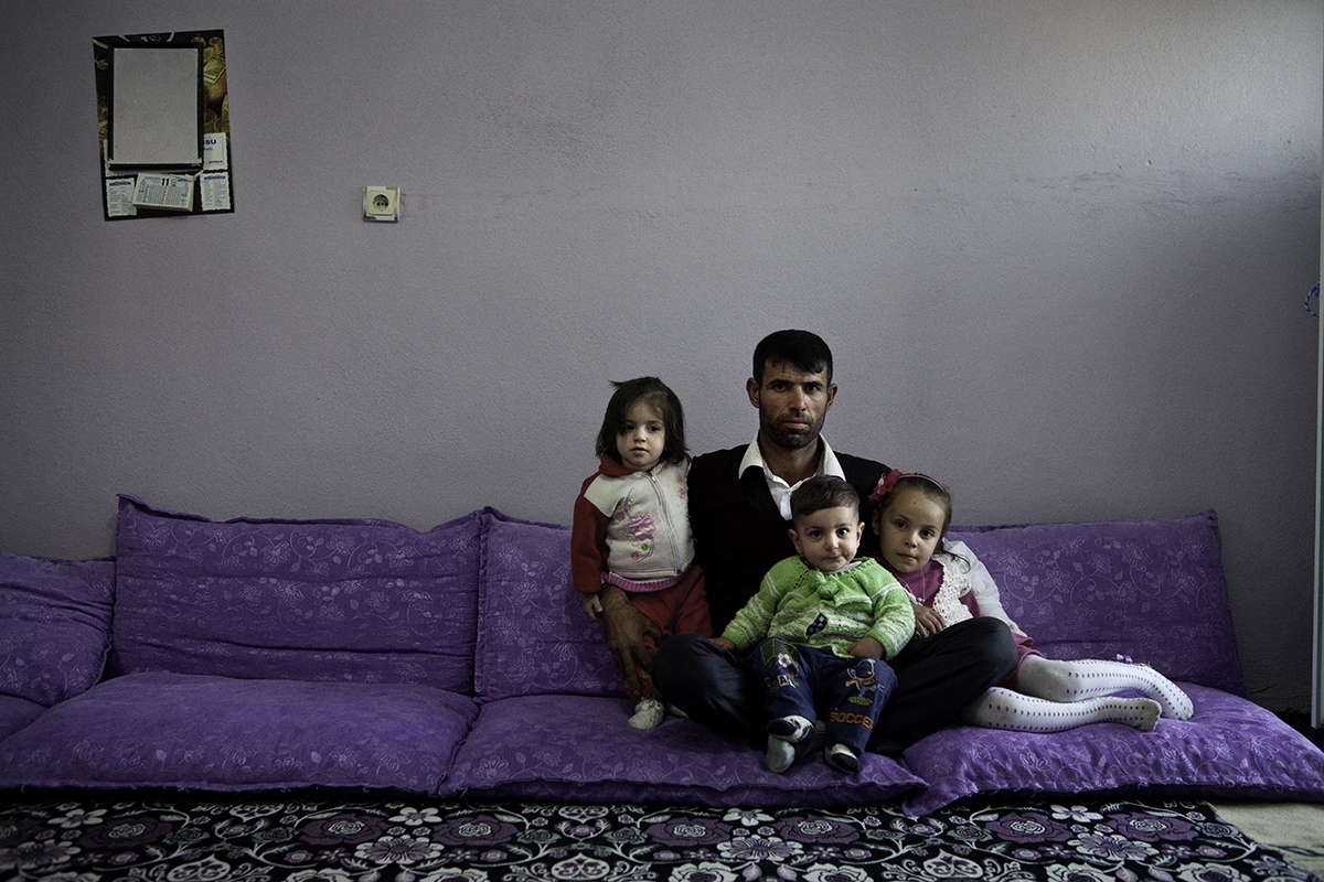 Kurdish Women: Inside, Outside -  Portrait of Seyma (5 years old) with her father and...