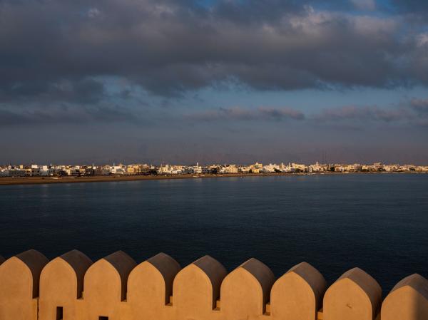 In Oman, a Dagger Symbolizes National Pride - SUR, OMAN-&shy;‐ NOVEMBER 22, 2022: Sur corniche seen from Al Ayjah Lighthouse. CREDIT:...