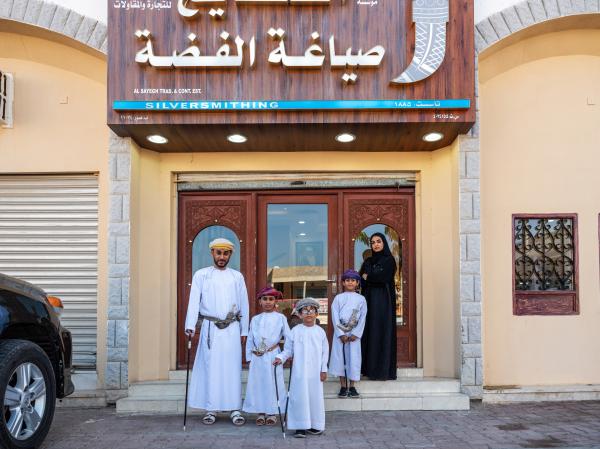 In Oman, a Dagger Symbolizes National Pride - SUR, OMAN-&shy;‐ NOVEMBER 22, 2022: Abdullah Al Farsi and his sons , Houd 8 (cousin), Al...