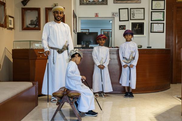 In Oman, a Dagger Symbolizes National Pride - SUR, OMAN-&shy;‐ NOVEMBER 21, 2022: Abdullah Al Farsi of Al Sayegh Silversmithing with his...