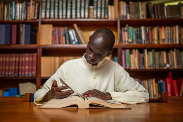 Photography - A seminarian studies at the library of St. Mary's...
