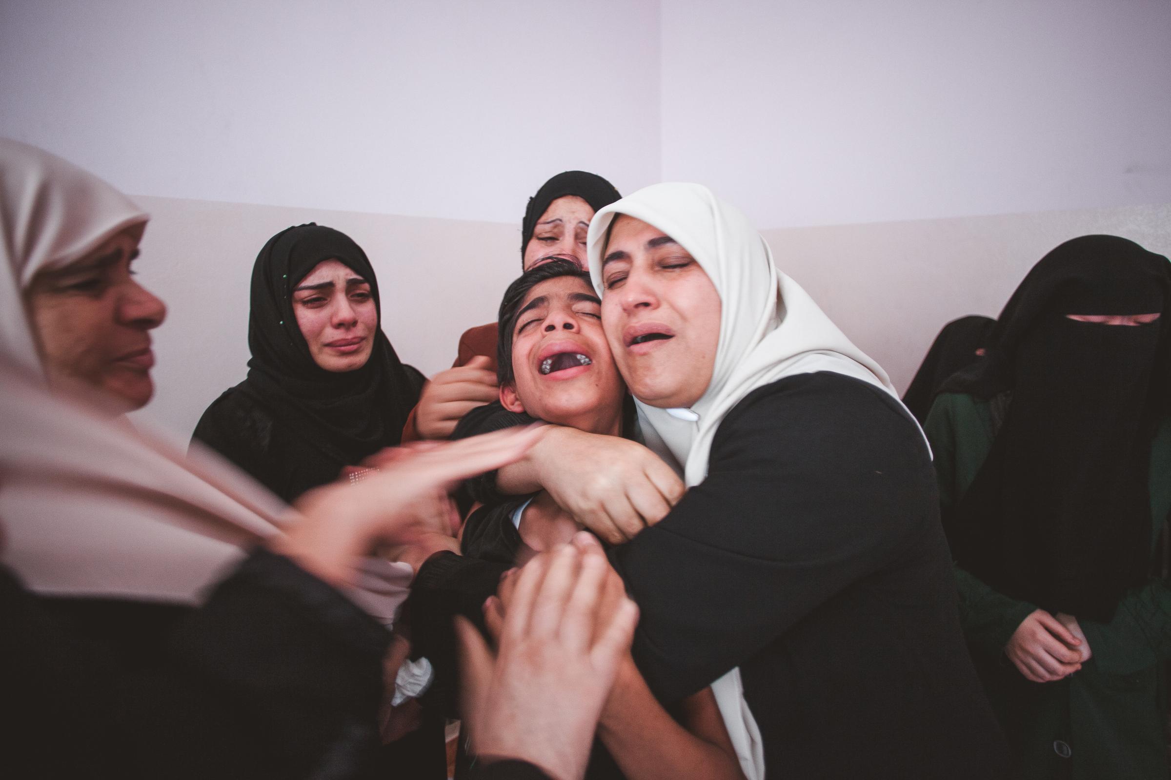 Gaza War 2014 - Relatives of Palestinian Marwan Sleem mourn during his...