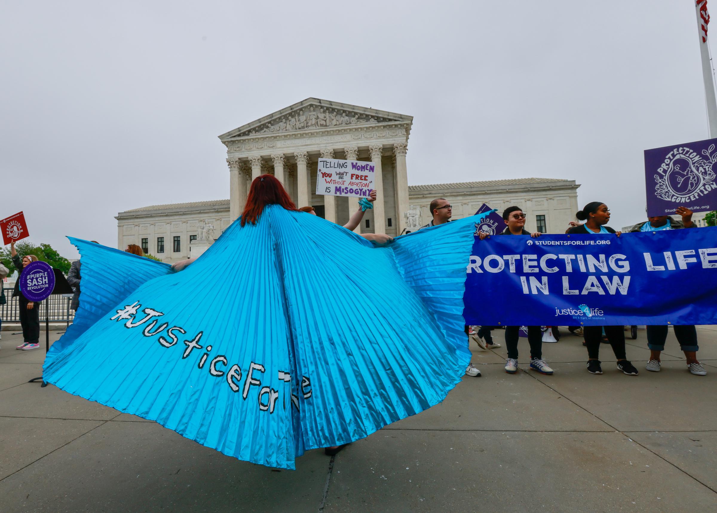 Roe v. Wade Overturned - Pro-choice protestors confront Anti-abortion protestors...