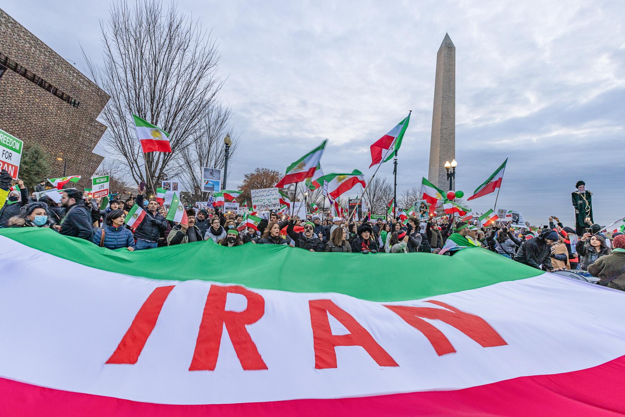 Iran execution: US protests - Washington, D.C. - December 10, 2022: Protesters holding...