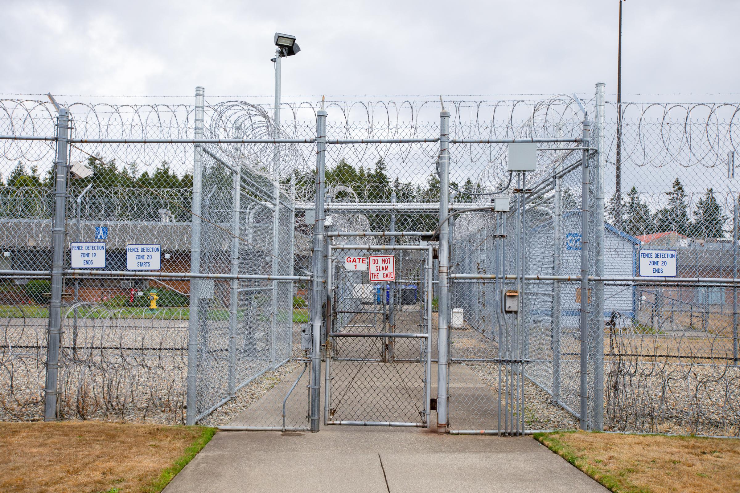 Razor wire-topped fences surrounding the maximum security building at the women&#39;s...