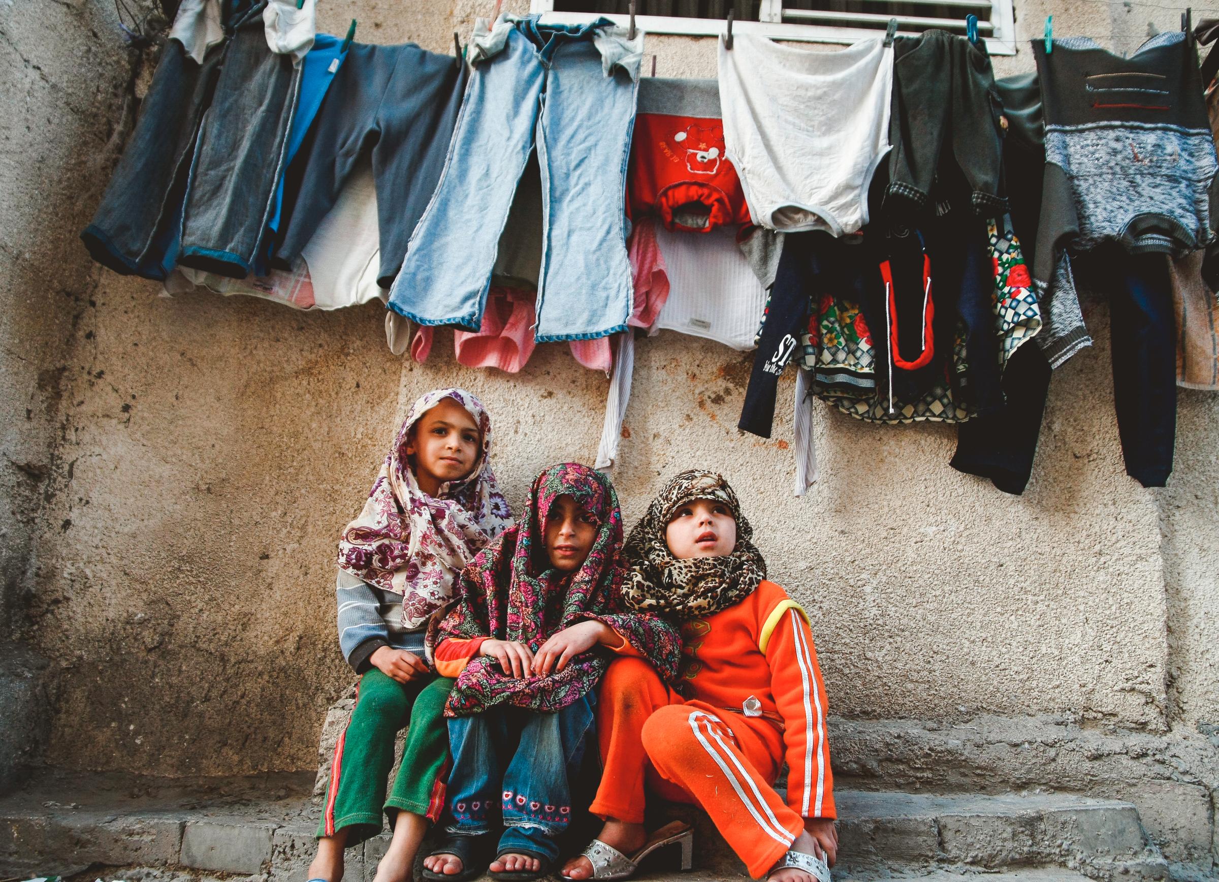 SINGLES - Gaza Strip, Palestine. Three Palestinian girls are...