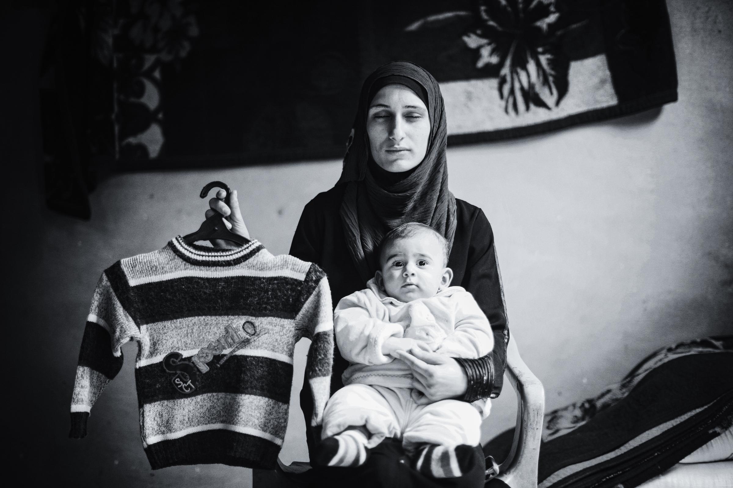  Safia Abo Zour, Gaza War 2011 &quot;nothing replaces the loss of a son,not even another son.&quot; Safia Abo Zour,25, holds her five...