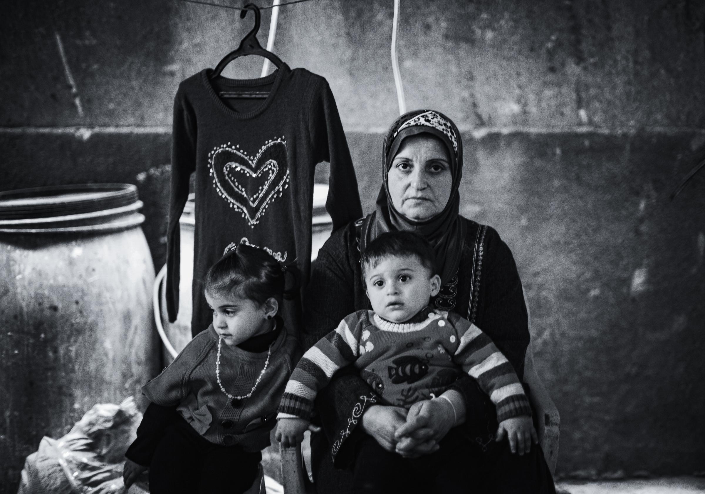 Broken souvenirs -  Um Haitham Abo Zour, Gaza War 2011:  "I saw blood...