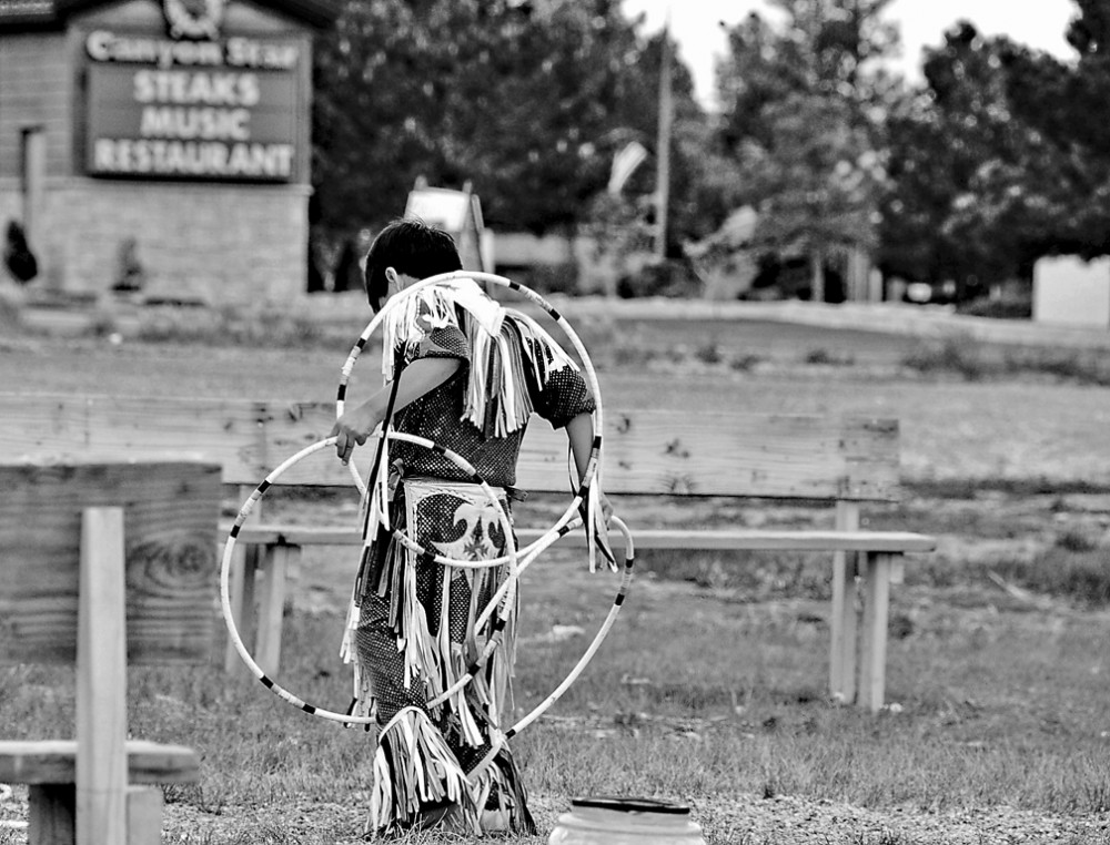 Hoop dance by Native American boy