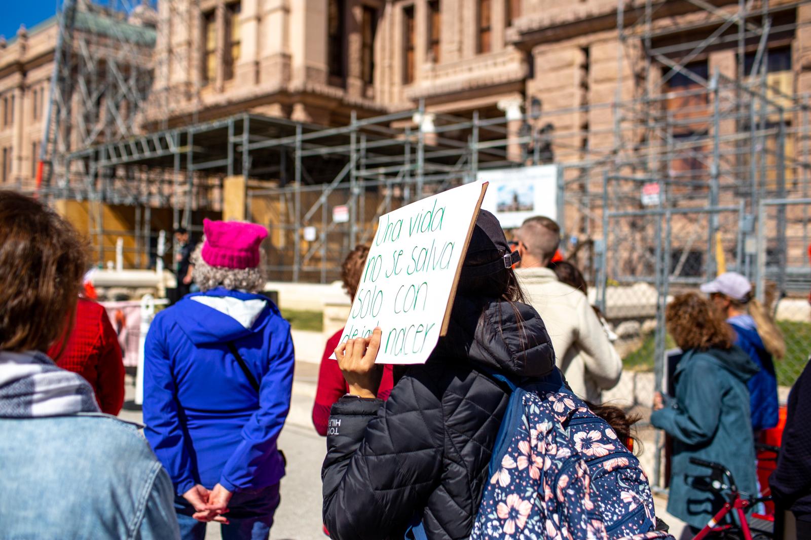 Signs held in protest and solid... Austin, TX, February 11, 2023.