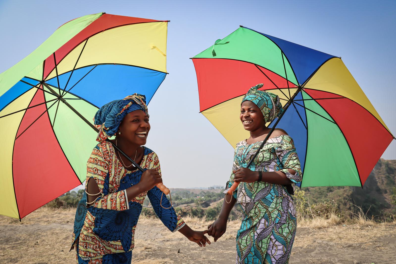 Néema Byanyira (left) chats wi... Esther N&#39;sapu for NPR 