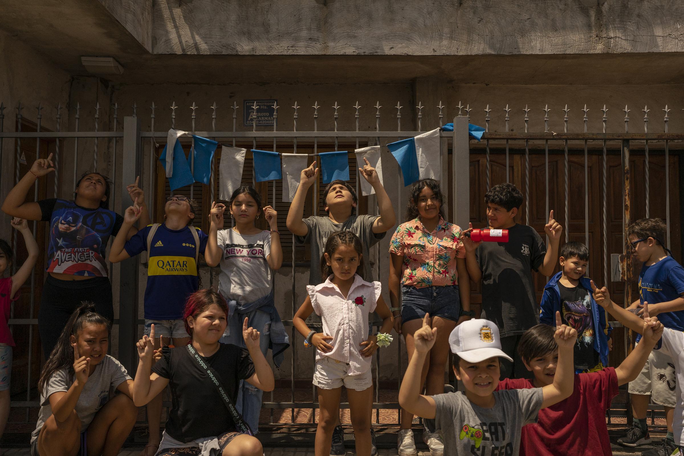 The city of Messi - A group of children arrive at La Bajada neighborhood to...