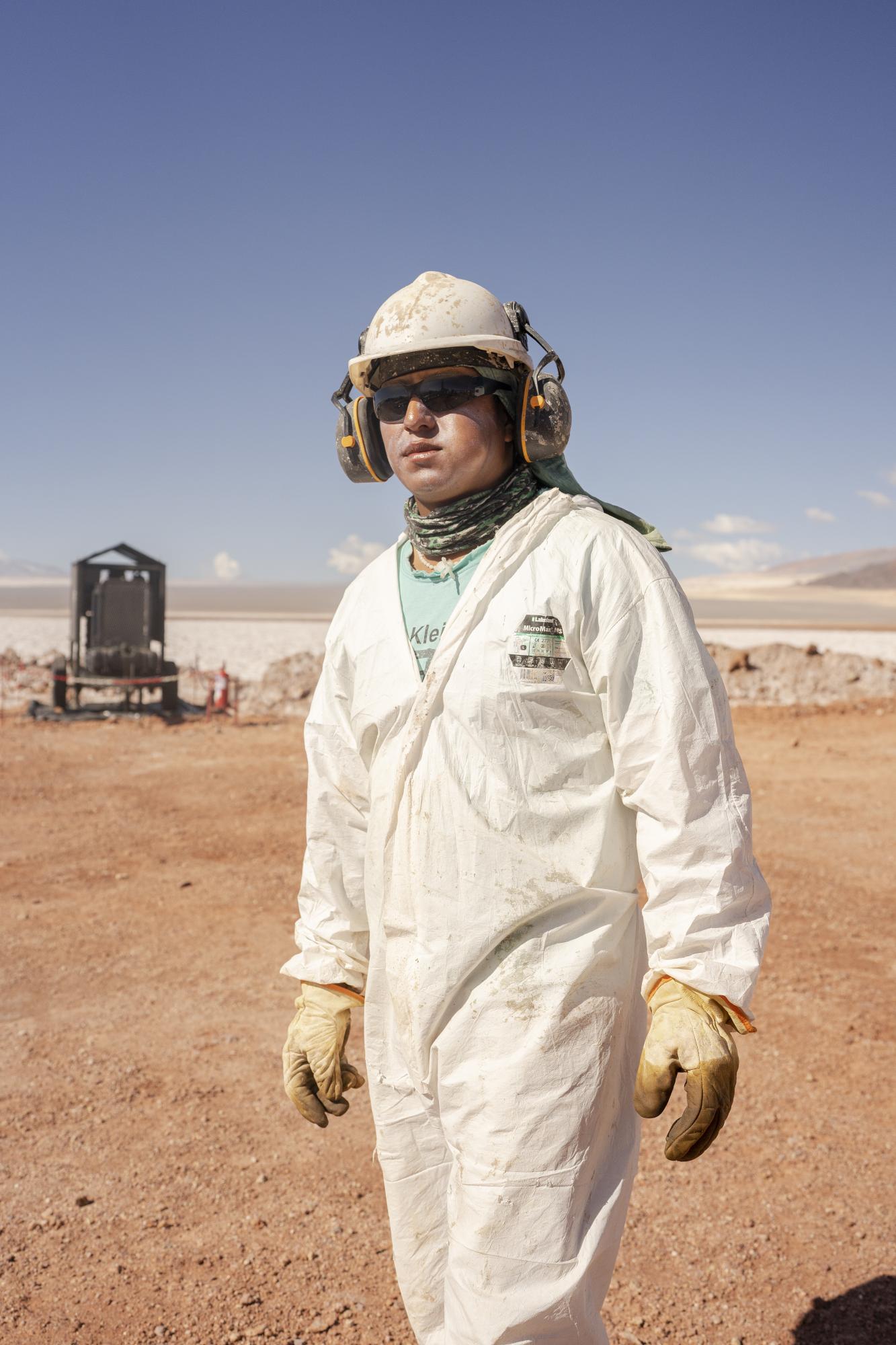 Lithium in Argentina - Worker at Lake Resources mining company. Photograph by...