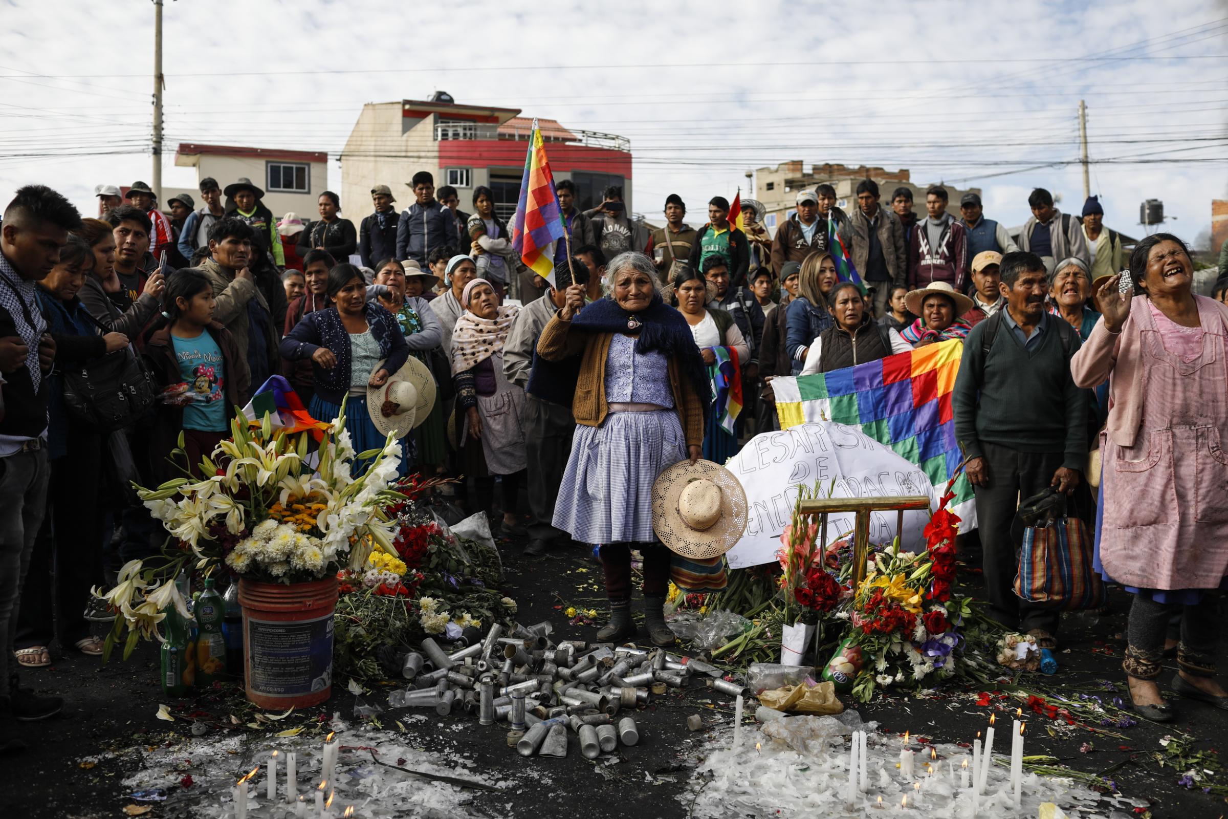 slideshow - Supporters of former Bolivian President Evo Morales mourn the death of a man, who they say was...