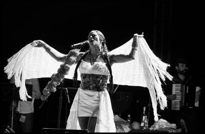 Image from Singles -  Singer Lila Downs performing "Cucurrucucú...