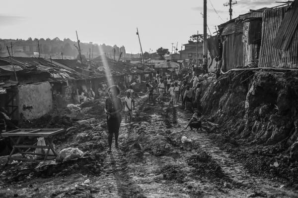 Image from Gordwin Odhiambo | A Changing Community and the Fears Ahead -  The site of a new road in Kibera. Roadside houses were...