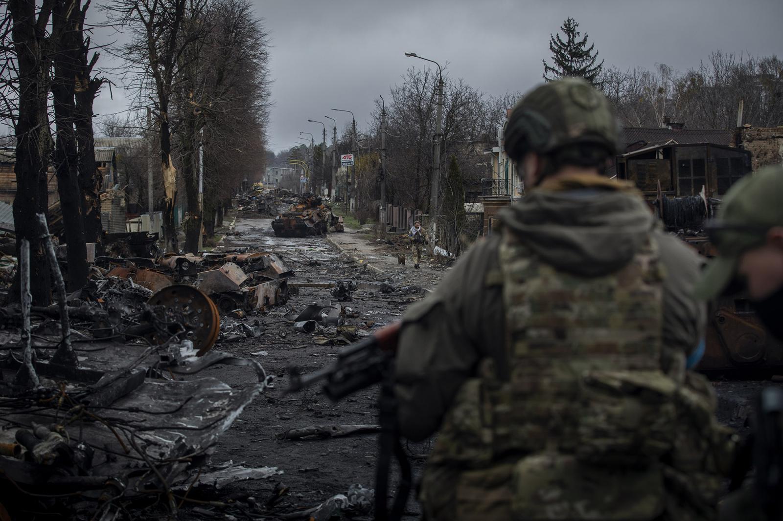  A row of Russian armored vehic...ding the tanks were destroyed. 