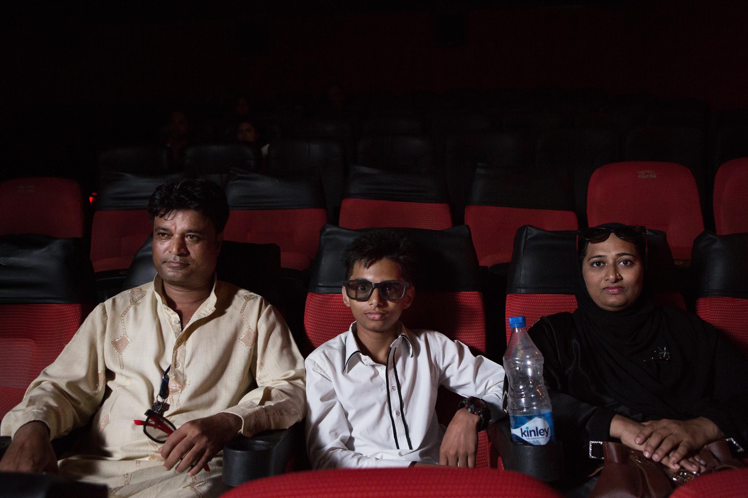 Bollywood Talkies - A family inside Metro Big Cinemas on Friday night. Metro...