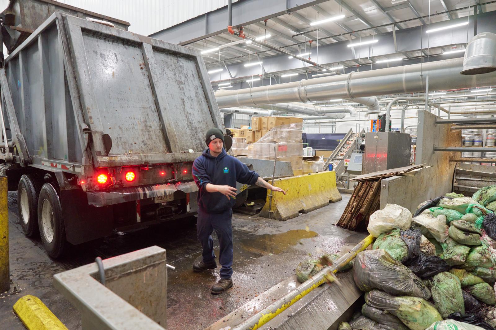 The Smithsonian Magazine: Manure Into Money - Agawam, Massachusetts - January 12: Food waste is dumped at the processing facility on January...
