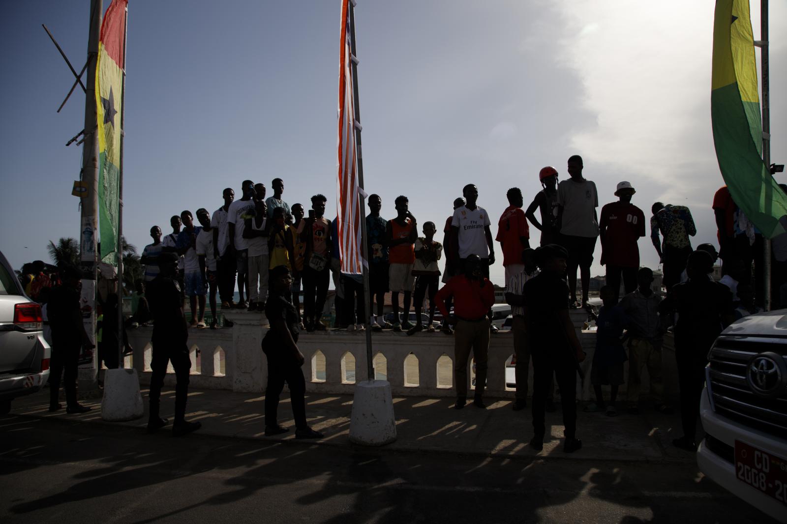 Image from U.S. Vice President Kamala Harris Visit To Ghana - Onlookers stand in a queue to catch a glimpse of U.S....