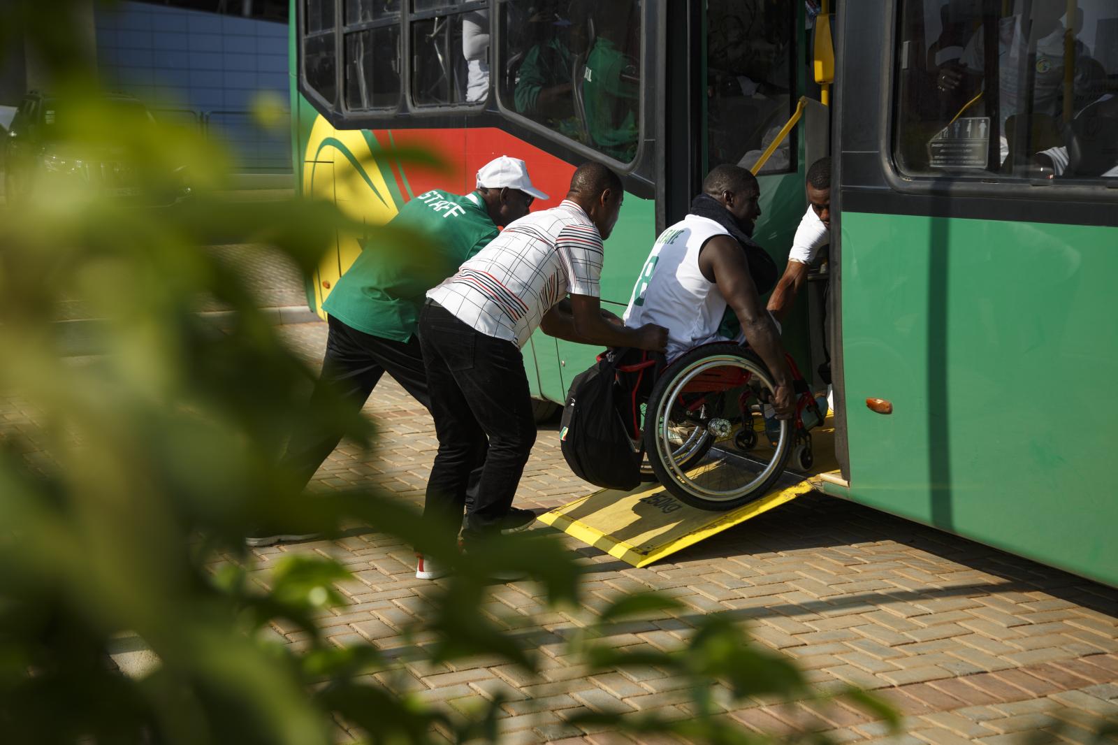 Image from First African Para Games  - Senegalese wheelchair basketball player is helped onto a...