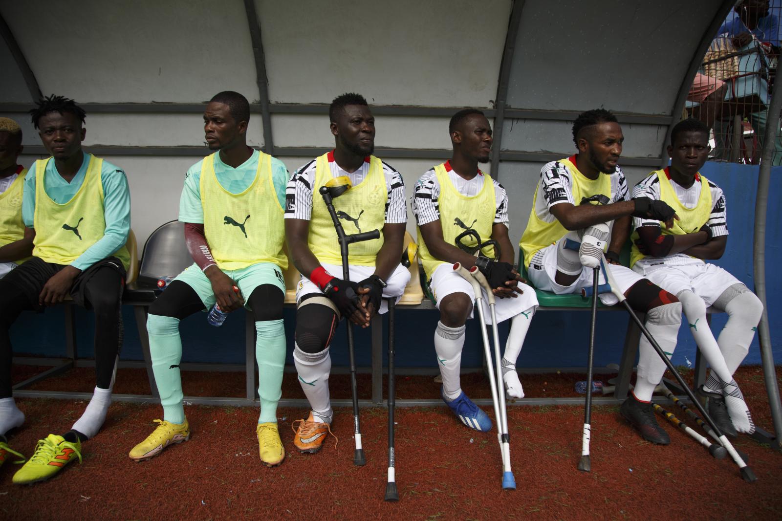 Image from First African Para Games  - Ghanaian amputee reserve players look on from the...