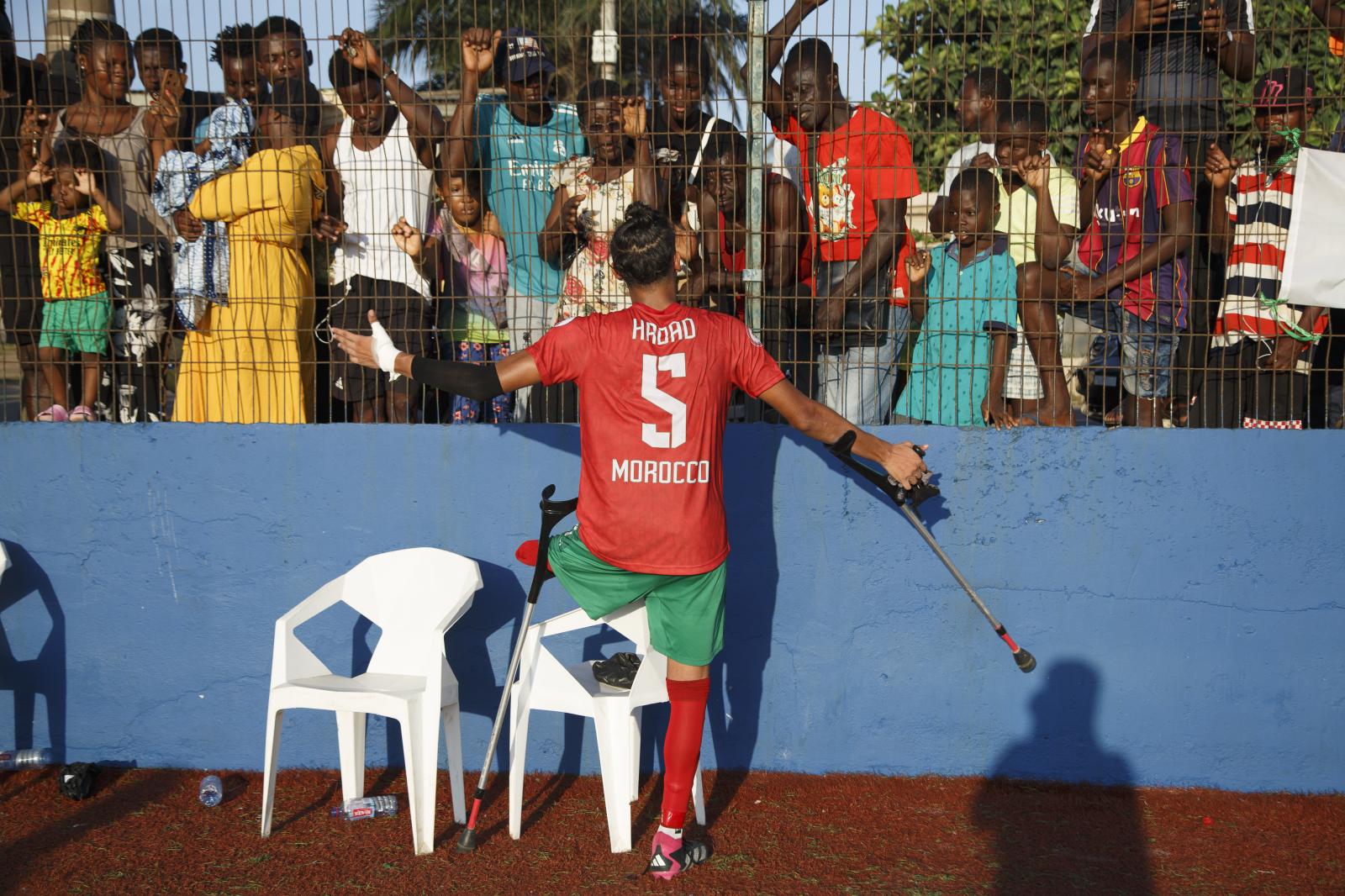 Image from First African Para Games  - Moroccan amputee football players interact with...